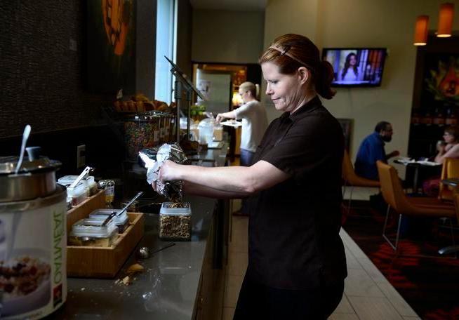 Woman working in a hotel kitchen